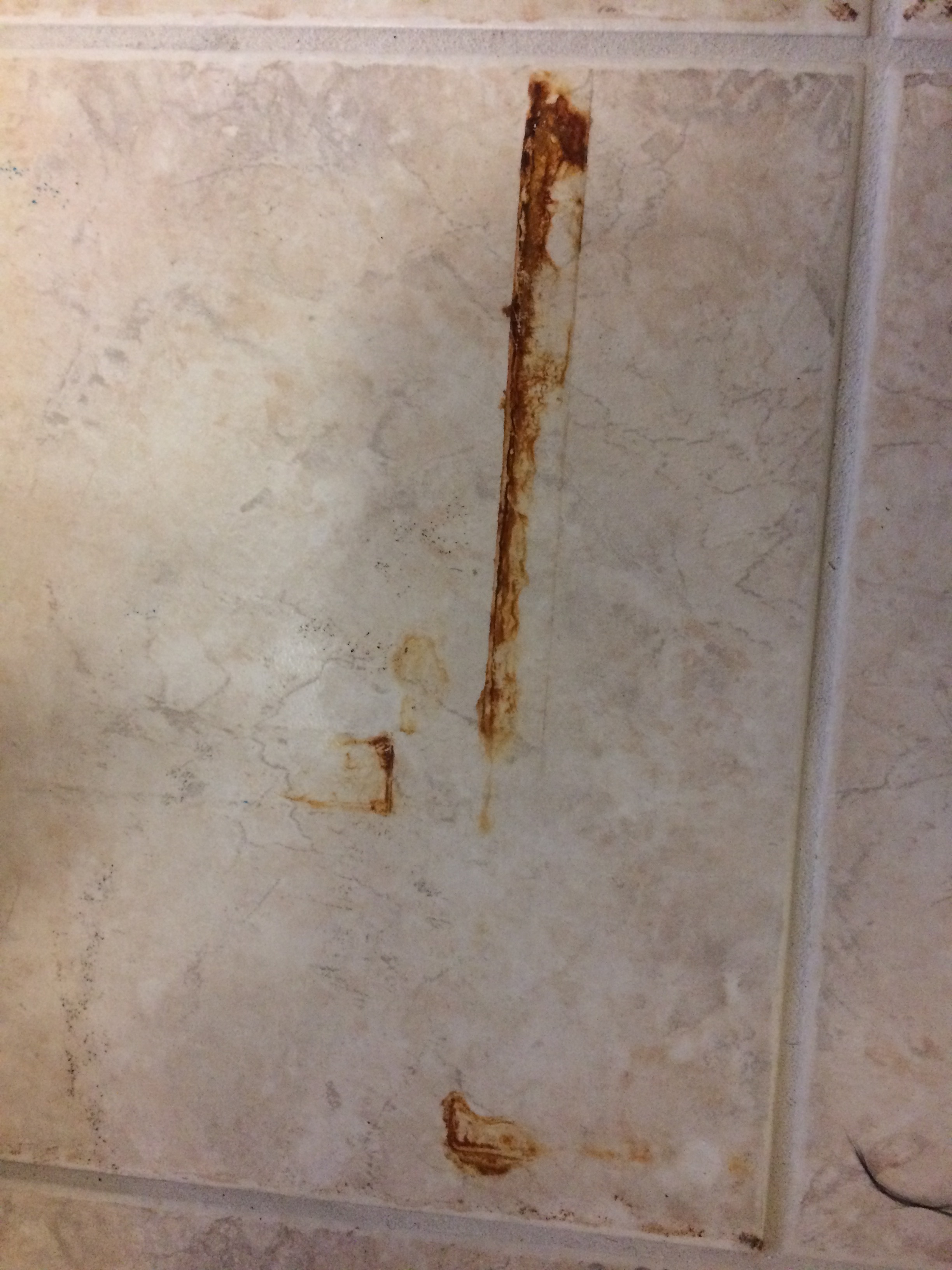 Rust stained tile floor
