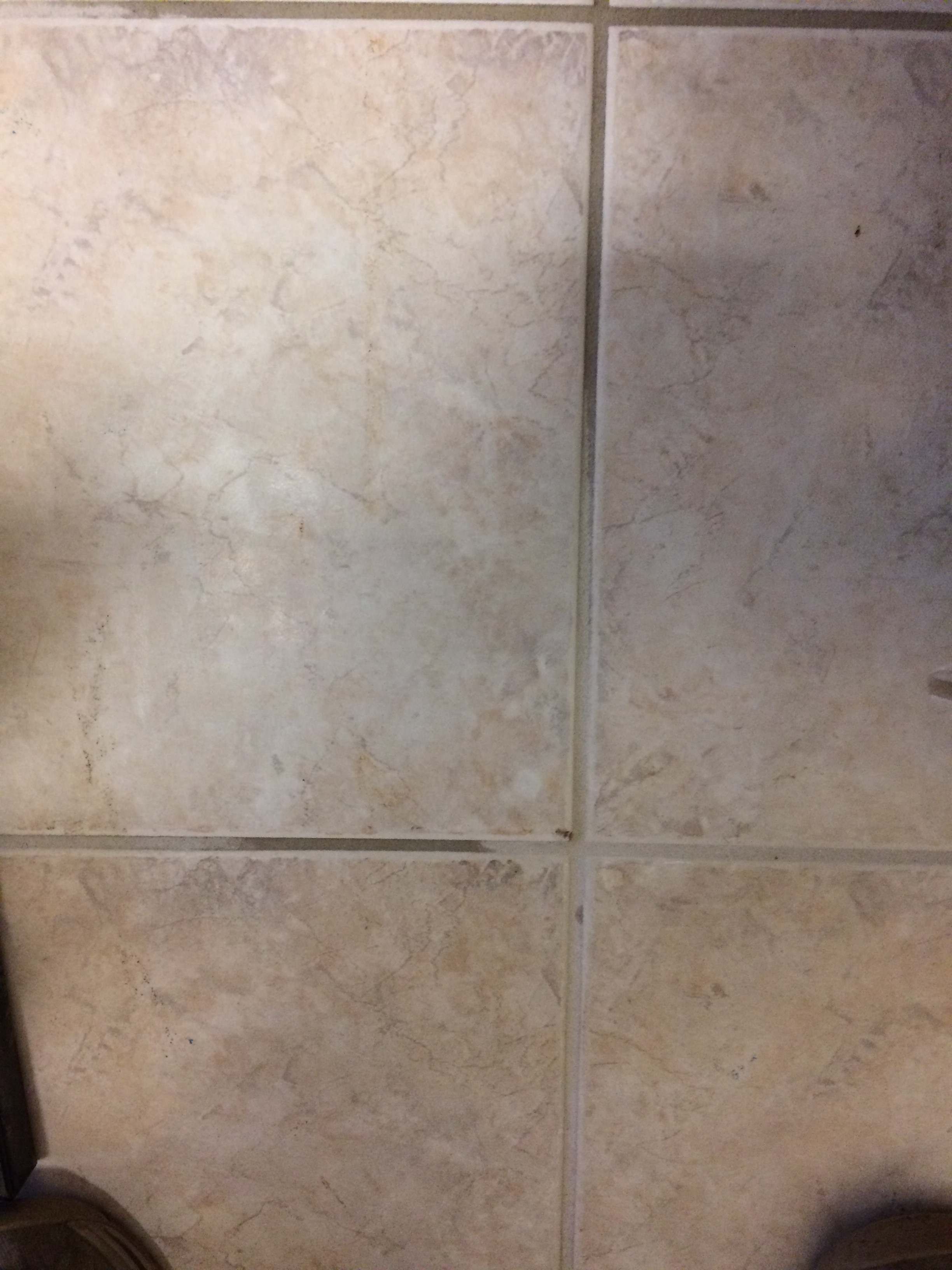 Cleaned rust stained tile floor Cleaned rust stained tile floor