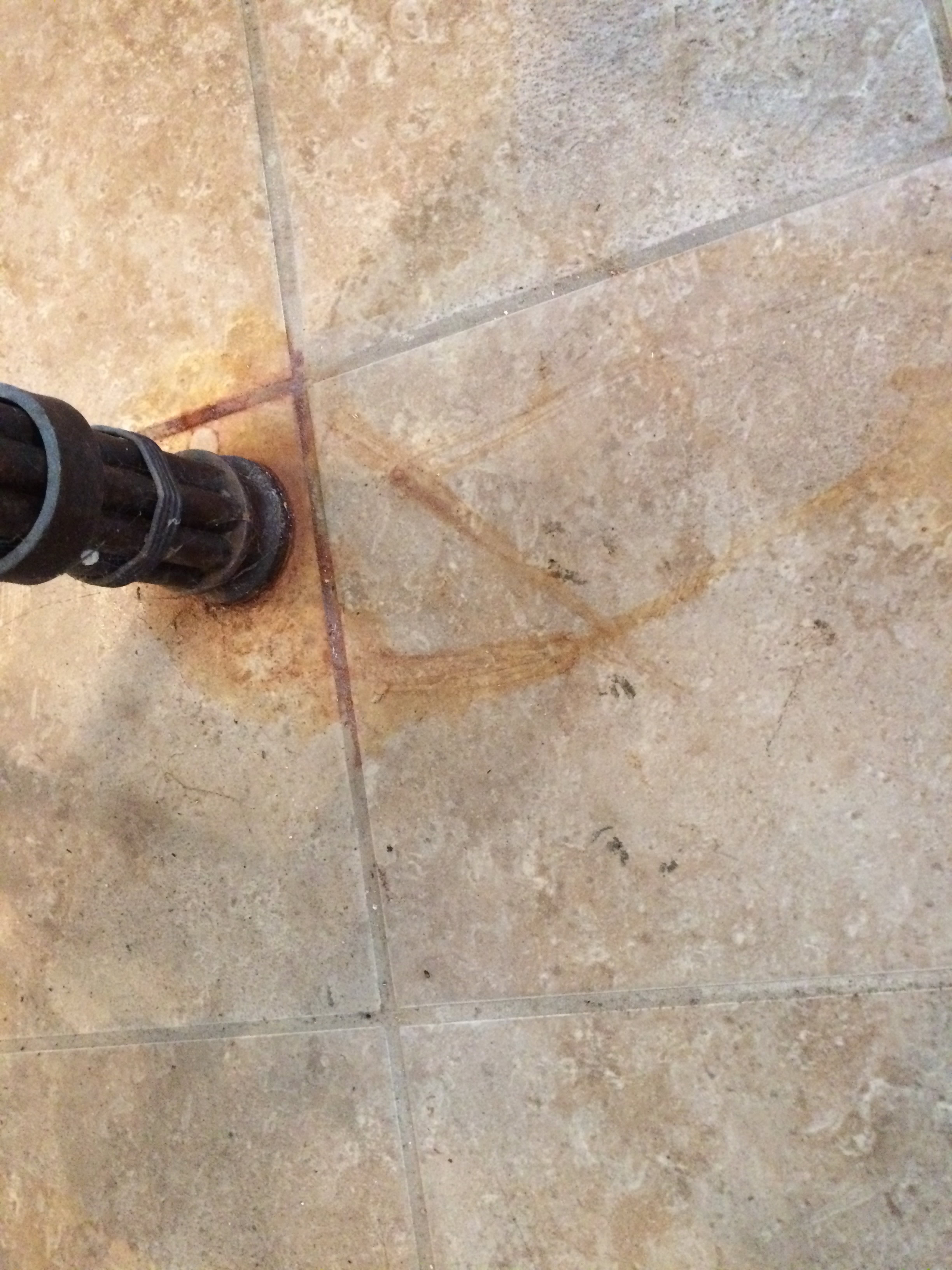 Another Rust stained tile floor Another Rust stained tile floor
